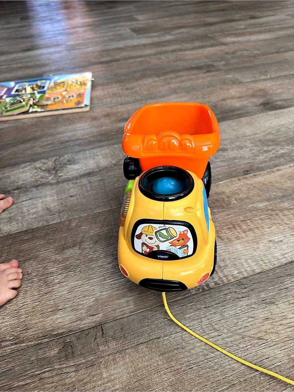 VTech Drop & Go Dump Truck Pull-Along Toy in Yellow & Orange